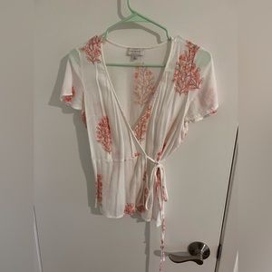 Feminine wrap blouse with tie back